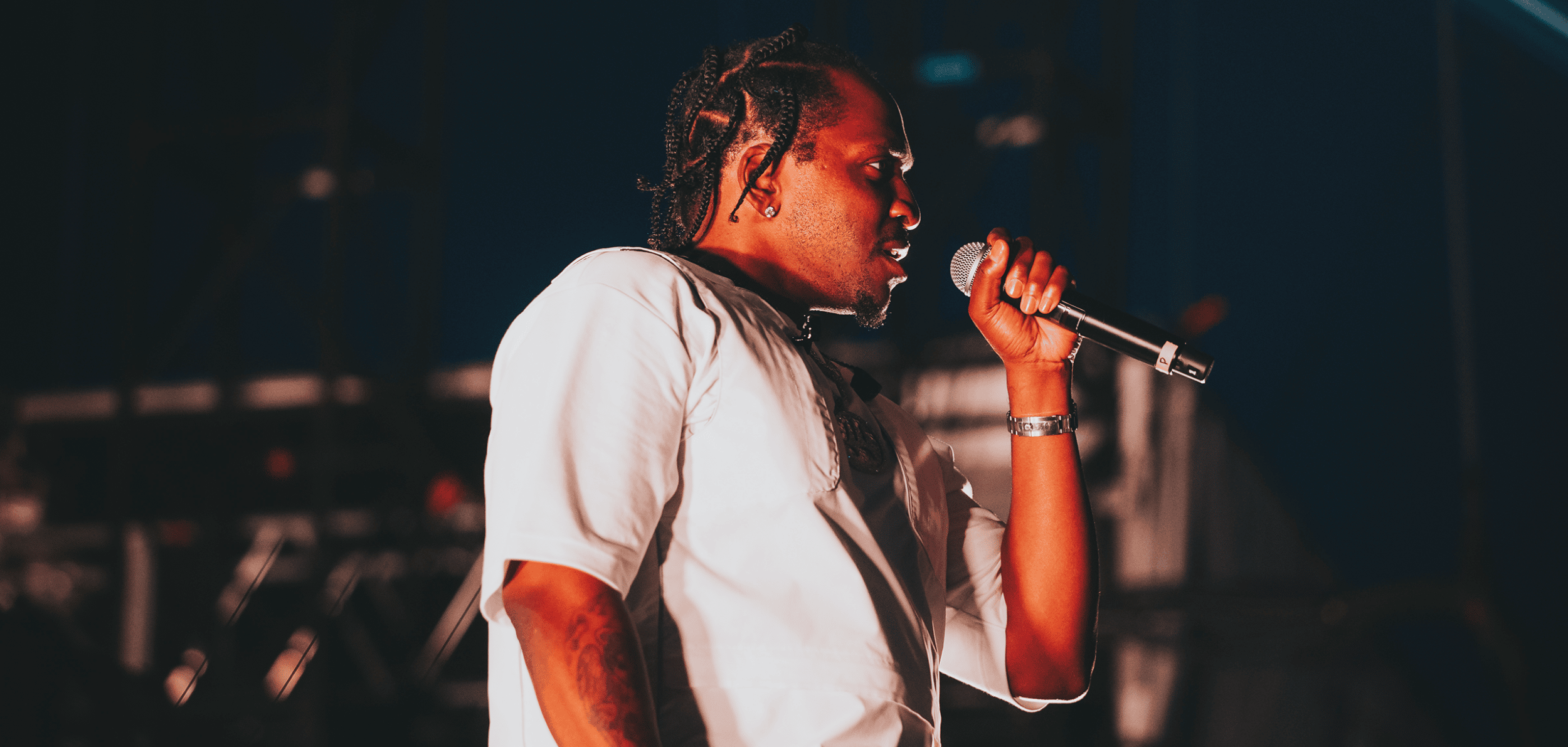 Pusha performing on stage at the Rooftop at Pier 17
